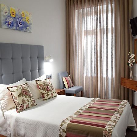 Lusitana Hotel Porto Buitenkant foto