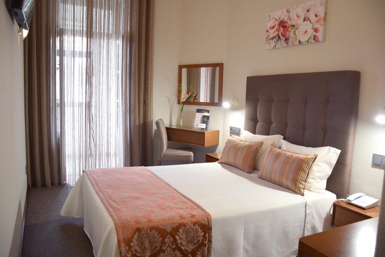 Lusitana Hotel Porto Buitenkant foto